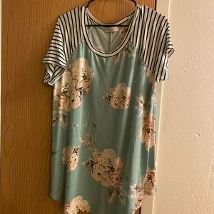 Brand new top, light blue/green with flowers and striped sleeves.